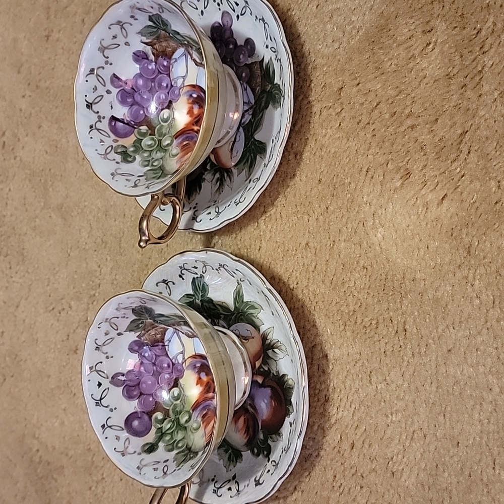 2 Japanese tea cups with saucers